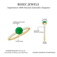 Natural emerald promise ring with diamond side stones from Rosec Jewels, showcasing a green emerald center and sparkling accents.
