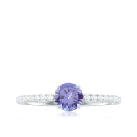 Certified real Tanzanite promise ring with diamond accents by Rosec Jewels, showcasing a solitaire Tanzanite gemstone on a ring setting.