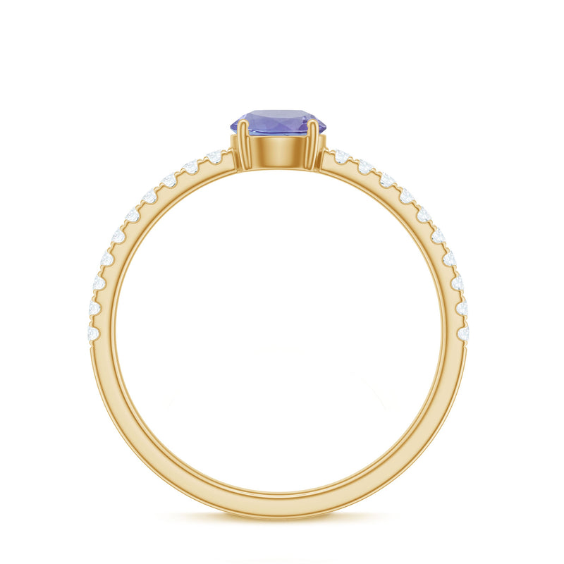 Certified real Tanzanite promise ring with diamond accents by Rosec Jewels, showcasing a solitaire Tanzanite gemstone in a elegant ring setting.