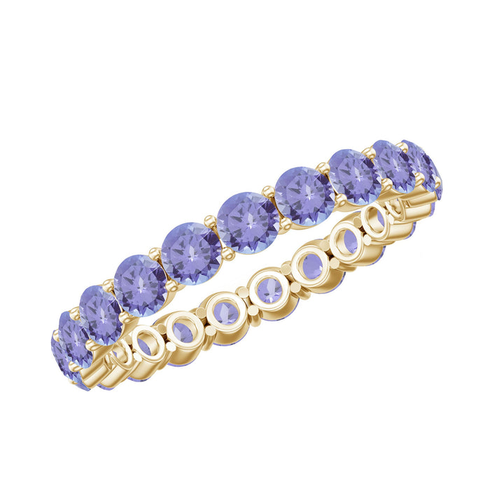 Real Tanzanite full eternity ring for women featuring vibrant blue-violet tanzanite gemstones, crafted by Rosec Jewels.