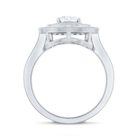 Oval moissanite engagement ring with milgrain detailing and double halo setting, showcasing intricate craftsmanship and sparkling stones.