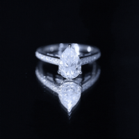 Classic Pear Cut Moissanite Solitaire Engagement Ring With Side Stones