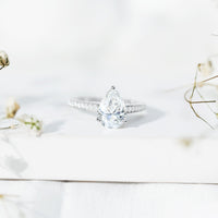 Classic Pear Cut Moissanite Solitaire Engagement Ring With Side Stones