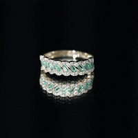 Baguette Emerald and Diamond Braided Half Eternity Band Ring