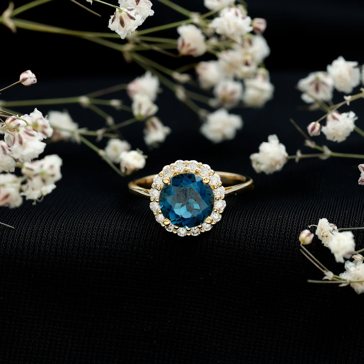 Rosec Jewels 2 Carat round London Blue Topaz engagement ring with diamond halo, showcasing a sparkling blue gemstone and elegant design.