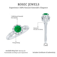 Vintage-inspired emerald engagement ring with diamond accents from Rosec Jewels, showcasing a detailed design and sparkling gemstones.