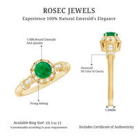 Vintage-inspired emerald engagement ring with diamond accents from Rosec Jewels, featuring a detailed gold band and intricate design.