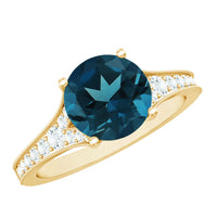 Natural London Blue Topaz and diamond engagement ring by Rosec Jewels featuring a central blue topaz gemstone and sparkling diamonds.