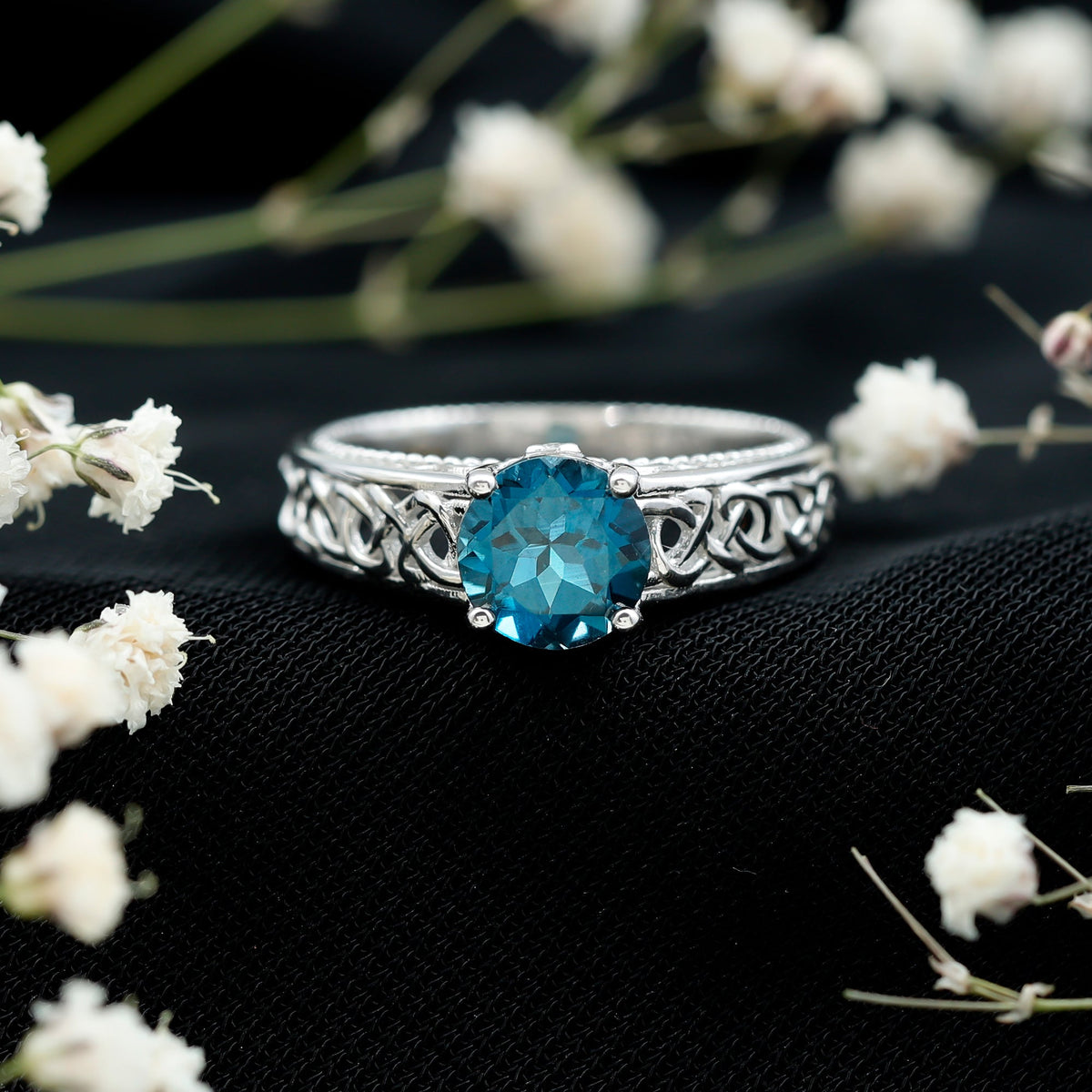Round 1.35 carat London Blue Topaz vintage engagement ring with Celtic-style band by Rosec Jewels