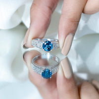 Round 1.35 Carat London Blue Topaz vintage engagement ring with Celtic-style band by Rosec Jewels, showcasing intricate design and sparkling gemstone.