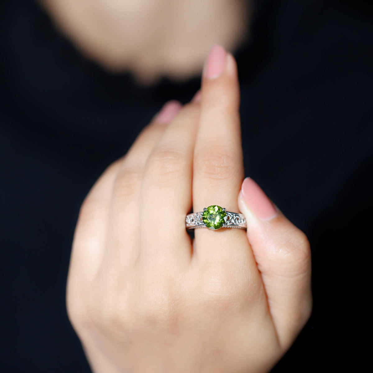 Real 2 Carat Peridot Celtic Knot engagement ring with a surprise diamond from Rosec Jewels, featuring intricate Celtic design.