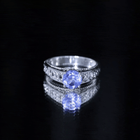 Yellow gold 1.6 carat lab-created tanzanite engagement ring with Celtic design by Rosec Jewels
