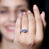 Lab created tanzanite engagement ring with Celtic design, 1.6 carats, by Rosec Jewels, featuring intricate metalwork and vibrant gemstone.