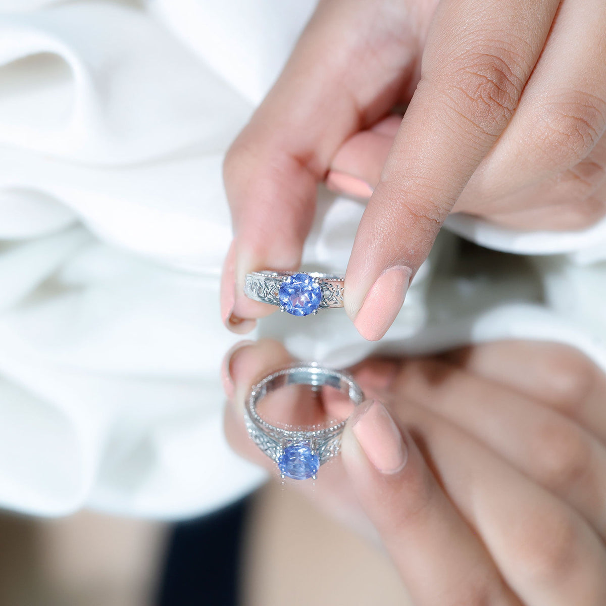 Rosec Jewels 1.6 Carat Lab Created Tanzanite engagement ring with intricate Celtic design and sterling silver band.