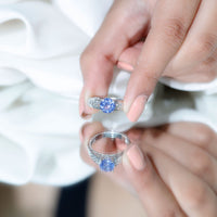 Rosec Jewels 1.6 Carat Lab Created Tanzanite engagement ring with intricate Celtic design and sterling silver band.