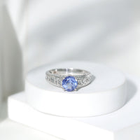 Rosec Jewels 1.6 carat lab-created tanzanite engagement ring with Celtic-inspired design, showcasing intricate metalwork and vibrant gemstone.