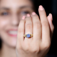 Rosec Jewels 1.6 Carat Lab Created Tanzanite engagement ring with Celtic design, showcasing intricate metalwork and a vibrant purple gemstone.