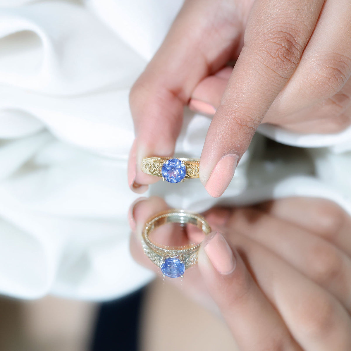 Rosec Jewels 1.6 carat lab-created tanzanite engagement ring with intricate Celtic design and sterling silver band.