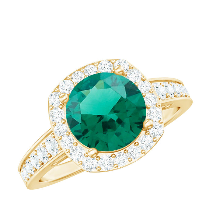 Vintage-style engagement ring with lab-grown emerald and diamond accents by Rosec Jewels, showcasing intricate design and sparkling gemstones.