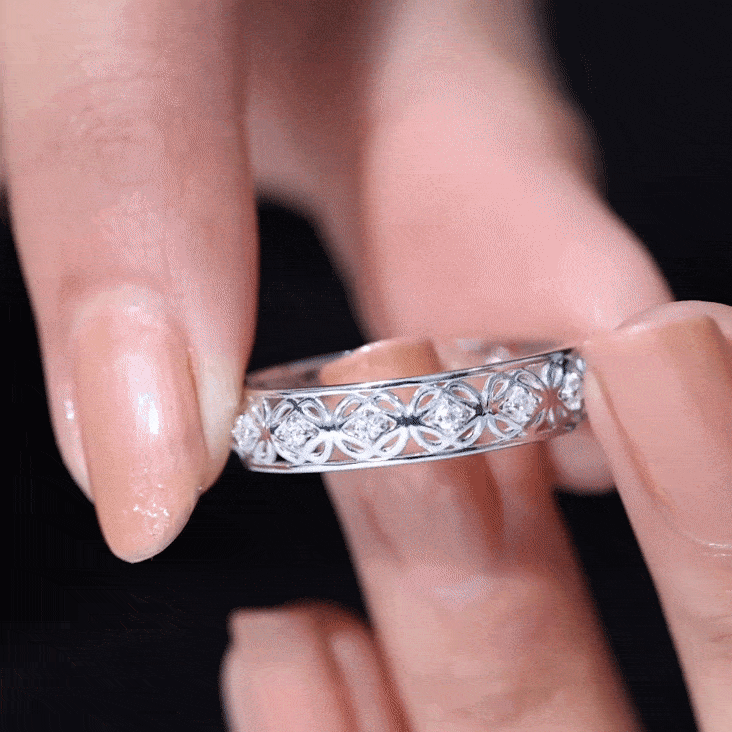 Rosec Jewels Moissanite Celtic Knot wedding band ring with intricate knot design and sparkling white moissanite stones.