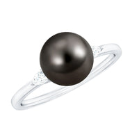 Round Tahitian pearl solitaire engagement ring with moissanite gemstone by Rosec Jewels, showcasing the elegant ring design.
