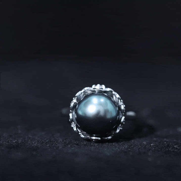 8 carat Tahitian black pearl solitaire engagement ring with floral setting by Rosec Jewels, showcasing the elegant ring design.