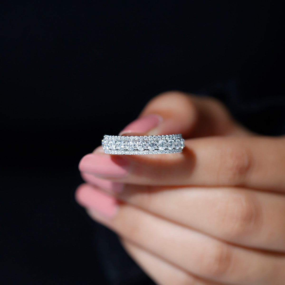 Round shape moissanite half eternity wedding band by Rosec Jewels, featuring sparkling stones in a sleek ring design.