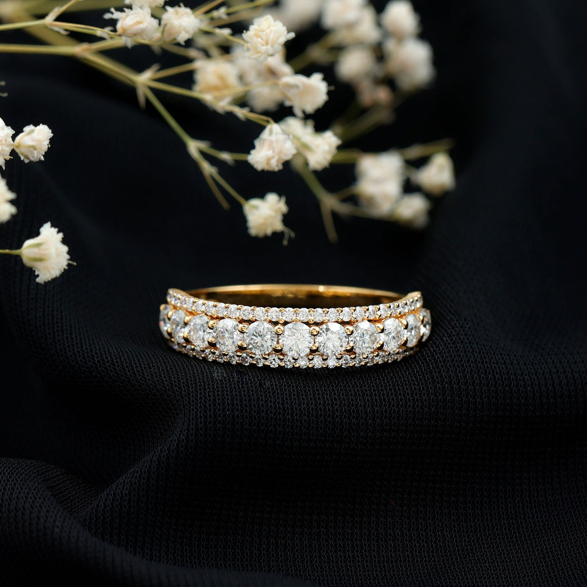 Round shape moissanite half eternity wedding band from Rosec Jewels, featuring a continuous row of sparkling stones on a sleek ring.
