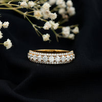 Round shape moissanite half eternity wedding band from Rosec Jewels, featuring a continuous row of sparkling stones on a sleek ring.