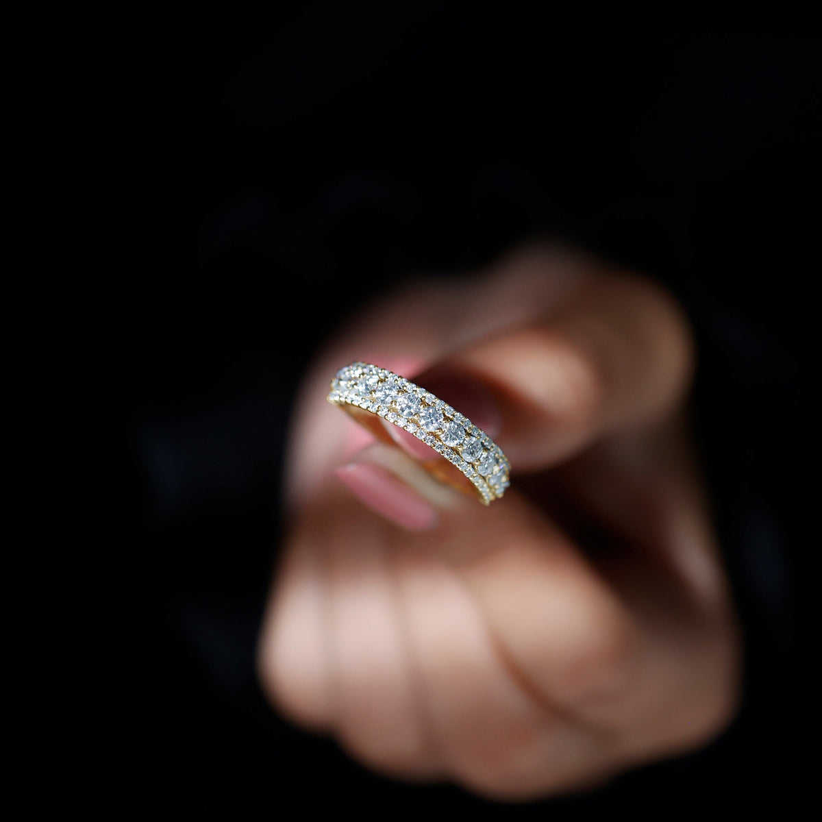 Round shape moissanite half eternity wedding band from Rosec Jewels featuring sparkling stones set in a sleek ring design.