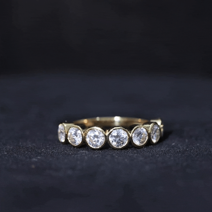 2.2 Carat Round Moissanite Half Eternity Ring in Bezel Setting