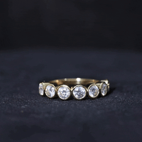 2.2 Carat Round Moissanite Half Eternity Ring in Bezel Setting