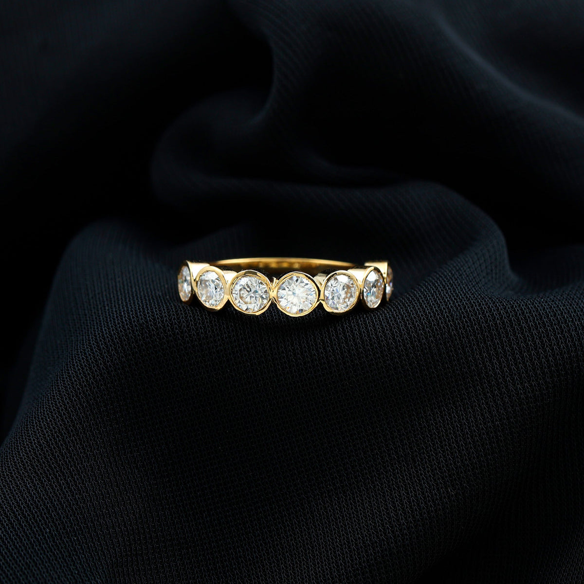 2.2 Carat Round Moissanite Half Eternity Ring in Bezel Setting