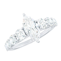 Marquise cut moissanite engagement ring with side stones from Rosec Jewels, featuring a sparkling central stone and elegant band.