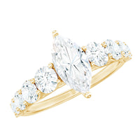 Marquise cut moissanite engagement ring with side stones from Rosec Jewels, showcasing a sparkling center stone and elegant band design.
