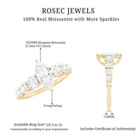 Marquise cut moissanite engagement ring with side stones from Rosec Jewels showing the sparkling central stone and side accents.