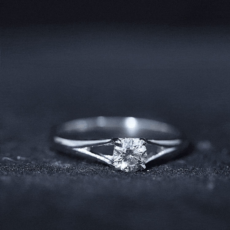Yellow gold certified diamond solitaire ring in claw setting, featuring a sparkling central diamond and elegant band.