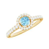 Certified natural aquamarine engagement ring with diamond halo featuring a silver band and intricate detailing by Rosec Jewels