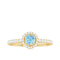 Certified natural aquamarine engagement ring with diamond halo, featuring a silver band and intricate detailing.