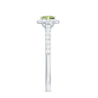 Genuine half carat peridot engagement ring with diamond halo by Rosec Jewels, featuring a vibrant green peridot center and sparkling diamonds.
