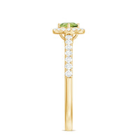 Genuine half carat peridot engagement ring with diamond halo from Rosec Jewels, featuring a central peridot gemstone and sparkling diamonds.