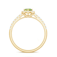 Genuine half carat peridot engagement ring with diamond halo from Rosec Jewels, showcasing a green peridot center with sparkling diamonds
