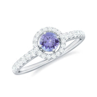 Natural Tanzanite and Diamond promise ring by Rosec Jewels, featuring a stunning center stone and sparkling side diamonds.