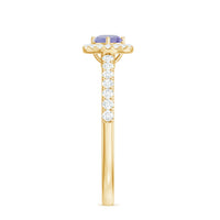 Rosec Jewels natural tanzanite and diamond promise ring, elegant engagement ring with a central tanzanite gemstone and sparkling diamonds.