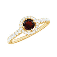 Rosec Jewels garnet minimal engagement ring with diamond halo, featuring a central garnet stone and delicate band design.