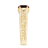Vintage style garnet diamond engagement ring with Celtic knot design from Rosec Jewels, featuring intricate metalwork and sparkling stones.