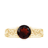 Vintage-style Garnet and Diamond engagement ring with Celtic knot design, featuring intricate metalwork and sparkling gemstones.
