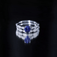 1.6 Carat Pear Lab Grown Blue Sapphire Engagement Ring with Diamond Band