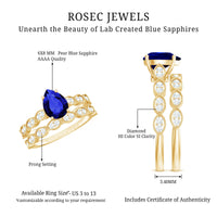 1.6 Carat Pear Lab Grown Blue Sapphire Engagement Ring with Diamond Band