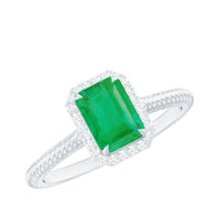 Natural 1.2 carat emerald engagement ring with diamond halo from Rosec Jewels, featuring a central emerald gemstone and sparkling diamond accents.